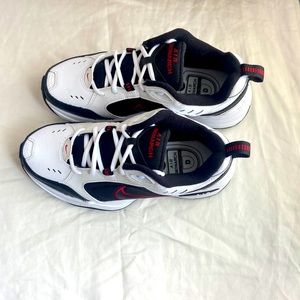 red, black and white nike air monarchs. size 7 in men’s (fits women 8)